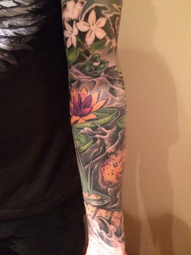 Work in Progress, koi and floral sleeve. By DJ Auld at Burnt Tiger, Chicago IL