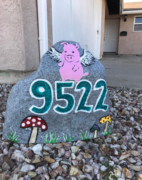 My house needed numbers so thought I'd get creative and painted this. Now it looks like I buried a pig out front. Gonna be hard explaining that one to the landlord..