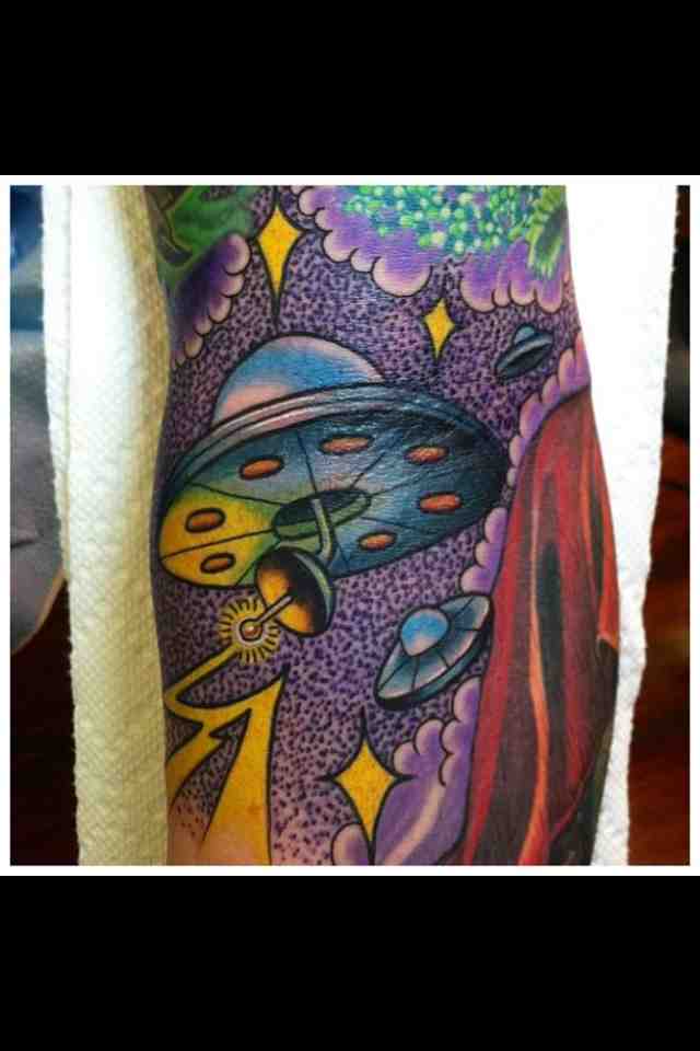 A fleet of UFOs in my arm ditch done by Jason Reeder