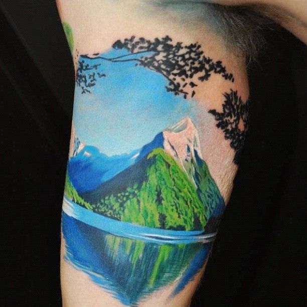 Mountain on arm. By Pepa @ NZ Tattoo Convention