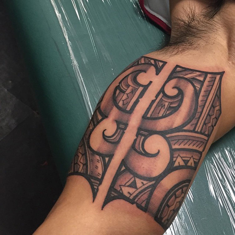 Filipino design tribal inside arm tattoo