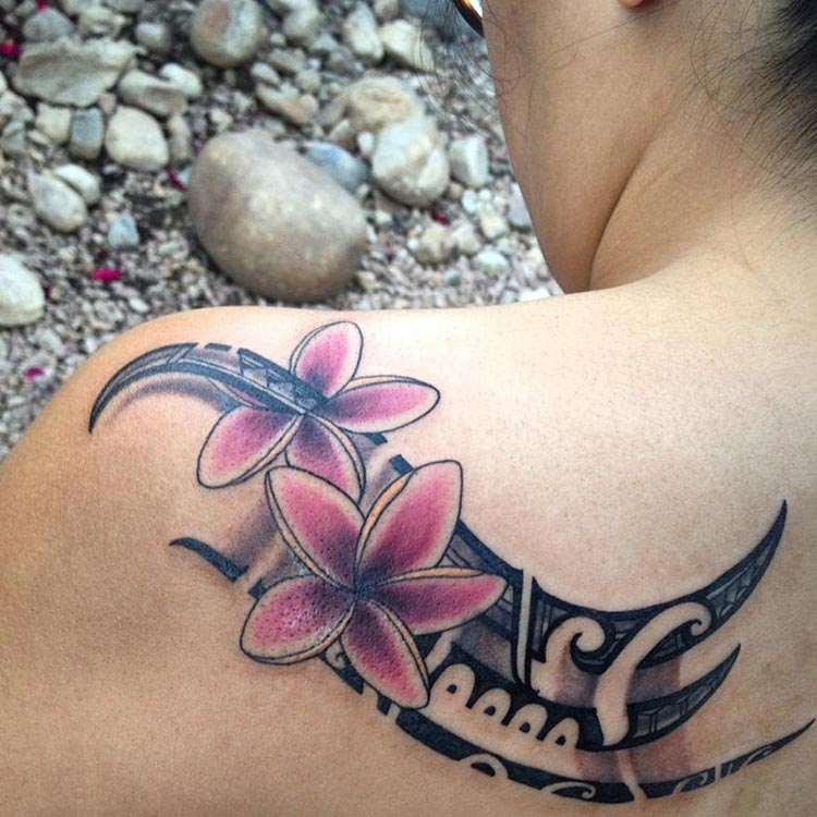 Womens tribal back tattoo with flowers