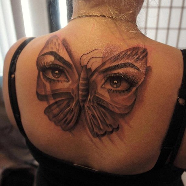 Interesting Eyes Butterfly Tattoo Design