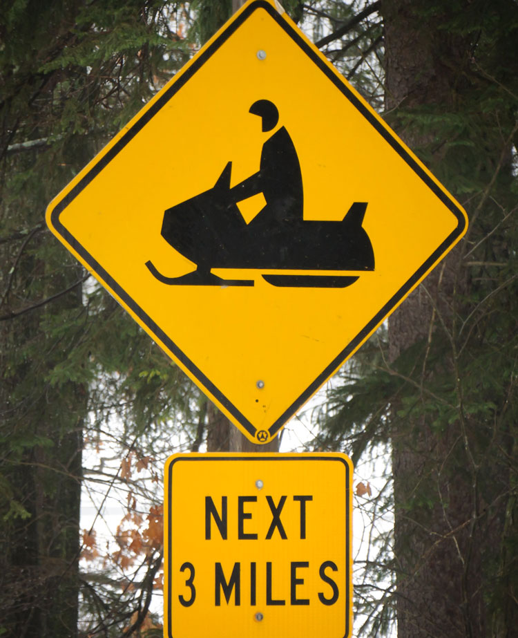 Caution! Pac-Man driving snowmobile