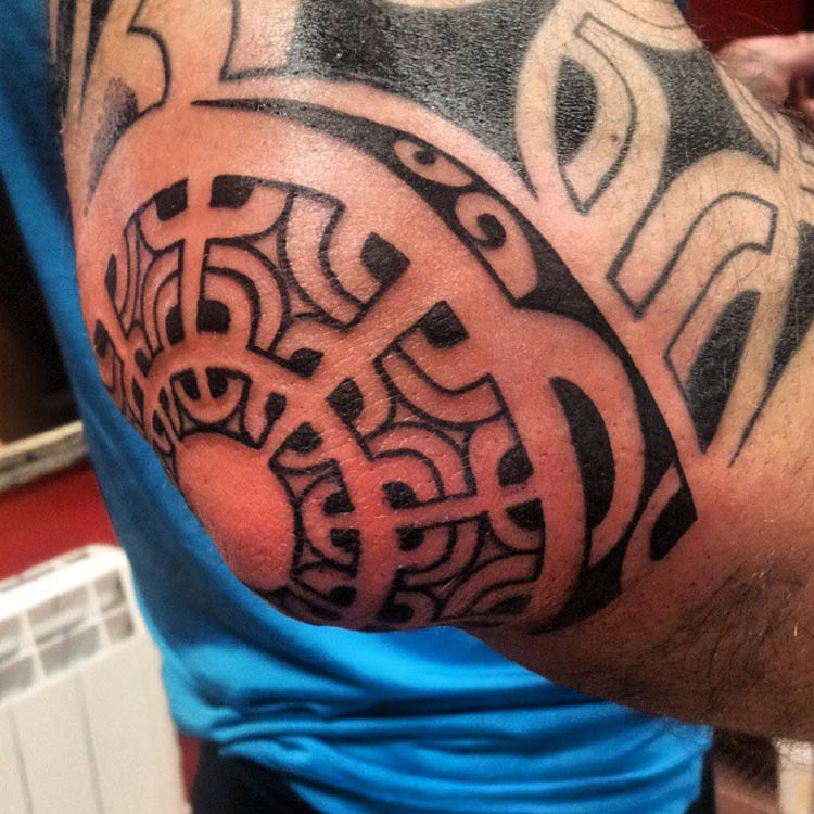 Polynesian Tribal Elbow Tattoo