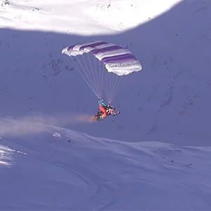 Flying Snowmobile: Crazy Guy With A Parachute And Snowmobile
