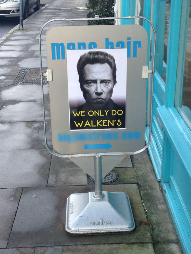A sign outside a local barbers.