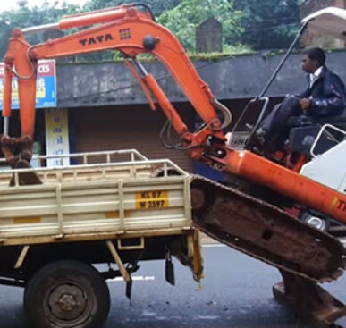 Guy Loads Excavator Without Ramps
