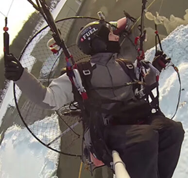 Paramotoring Skills: Daredevil Flies Within Inches Of Buildings