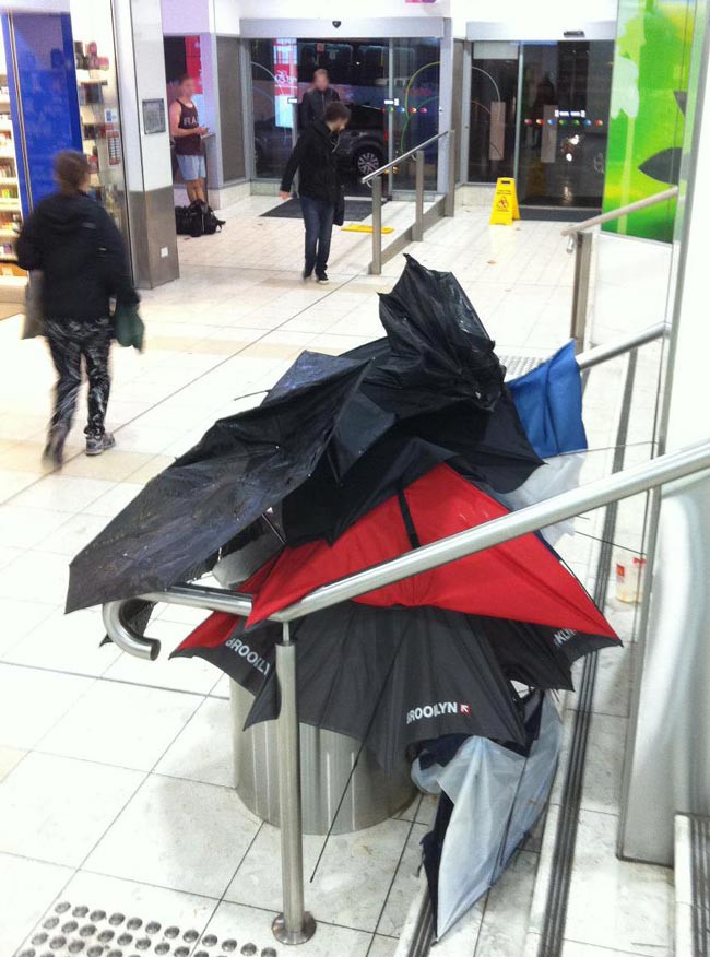 Fierce storms in Sydney today. Countless brave, but cheap little umbrellas fought the wind and rain. And lost.