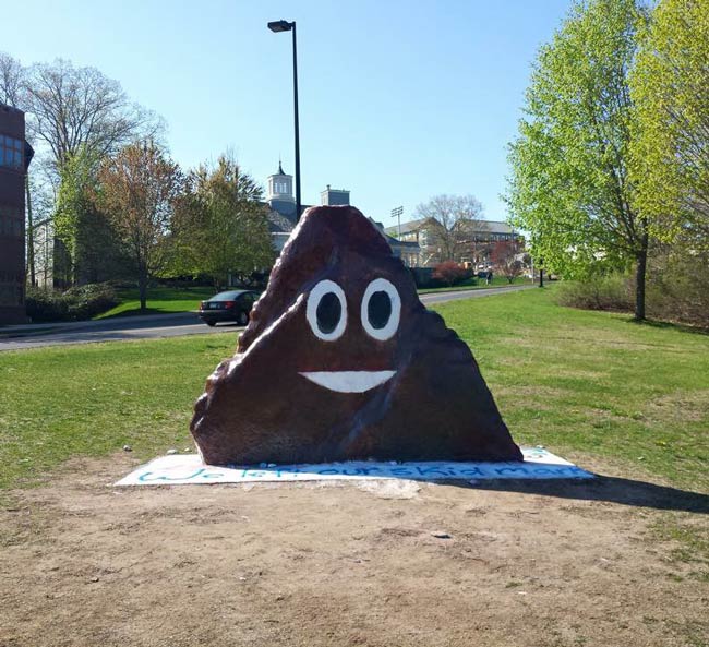 Someone painted the poop emoji on the spirit rock at my university.