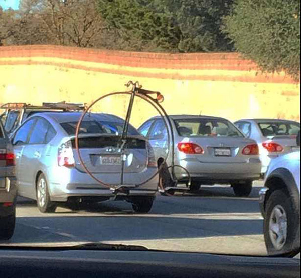 Penny farthing bike on a car