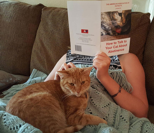 Reading to my cat.