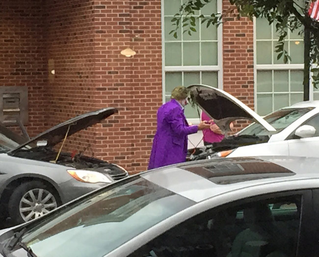 So the Joker is jump starting a woman's car outside of the bar I am drinking at.