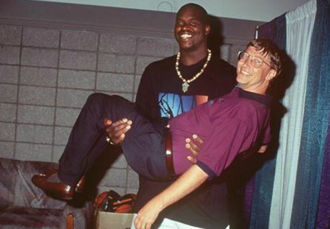 Shaquille O'Neal holding Bill Gates