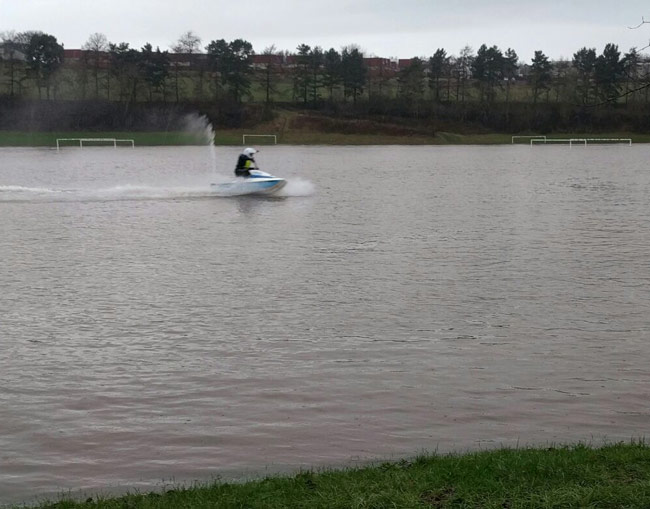 I live in Scotland. These football pitches flooded, and this guy turned up on a jetski