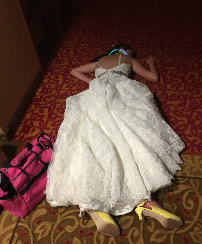 Wifey sleeping on the hotel hallway after our wedding