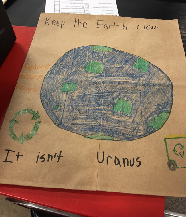 We had a local elementary school decorate paper bags for Earth day. This kid