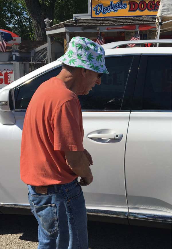 My 75 year old father-in-law was buying fishing gear. He came out of the store wearing this hat because he liked the "flowers" on it
