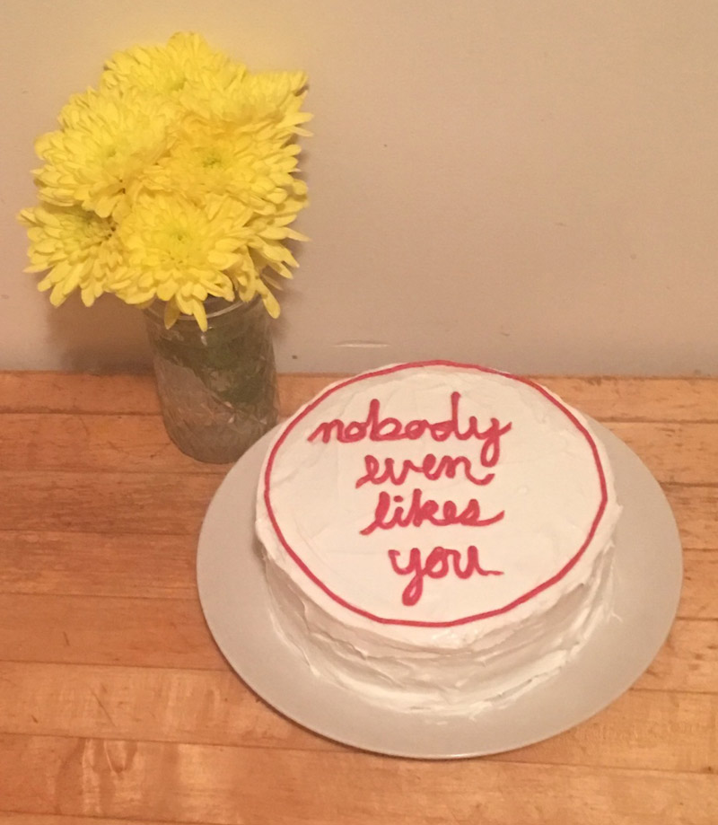 I moved into my girlfriend's apartment today and her roommate baked me a cake