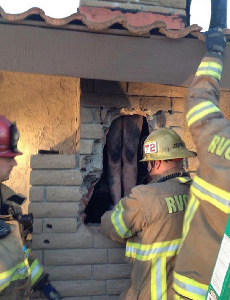 Woman tries getting into ex boyfriends house by sliding down chimney like Santa Claus, didn't go as planned