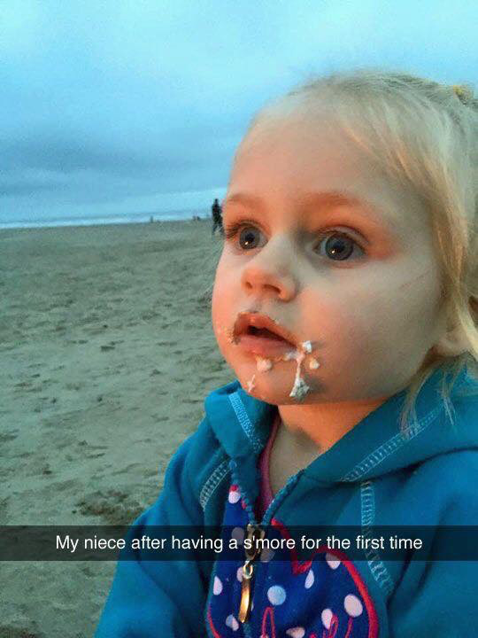 My niece after trying a s'more for the first time