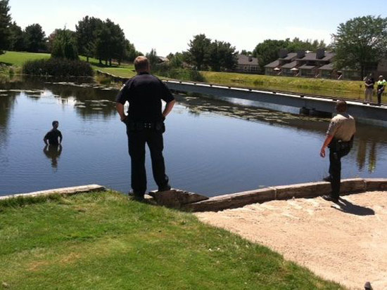 Suspect in my hometown jumped into the middle of a pond to avoid arrest; standoff ensued