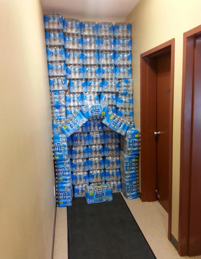 When your boss is a dick and demands you stack the water "so it looks nice"