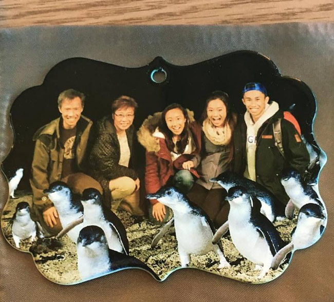 Ordered a custom family photo ornament. Received one with a random Asian family and photoshopped added penguins. Not even mad