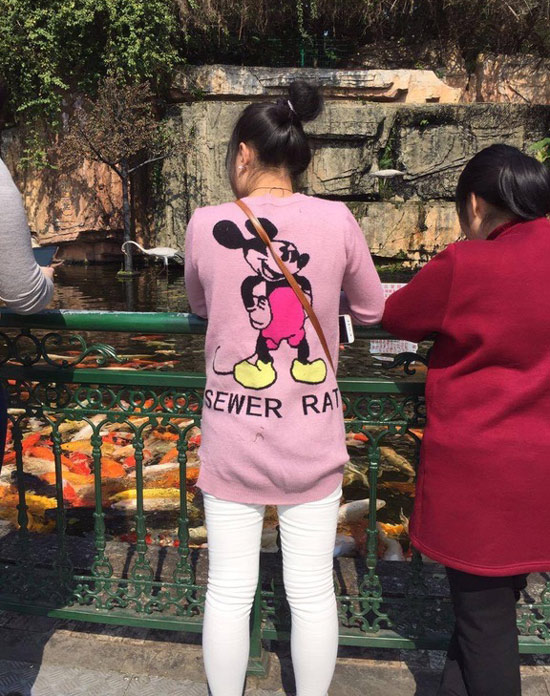 My girlfriend's in China, she sent me photo of girl wearing Mickey Mouse shirt, but something's not quite right...