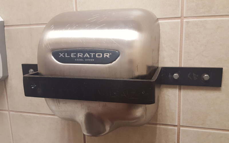 You may be in a bad neighborhood when you are afraid of someone stealing your gas station hand dryer