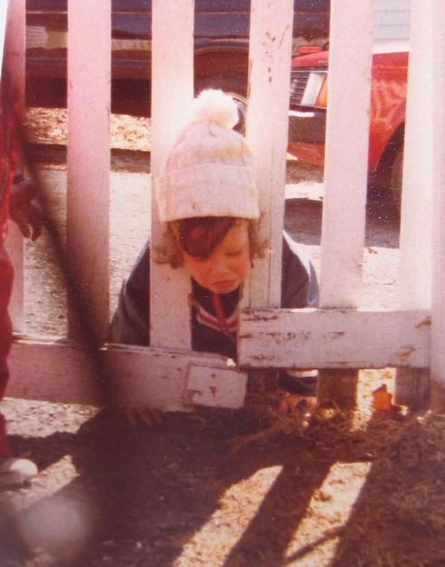 When I was small I got my head stuck in a fence and instead of assisting me, my parents ran for the camera. This is my earliest memory