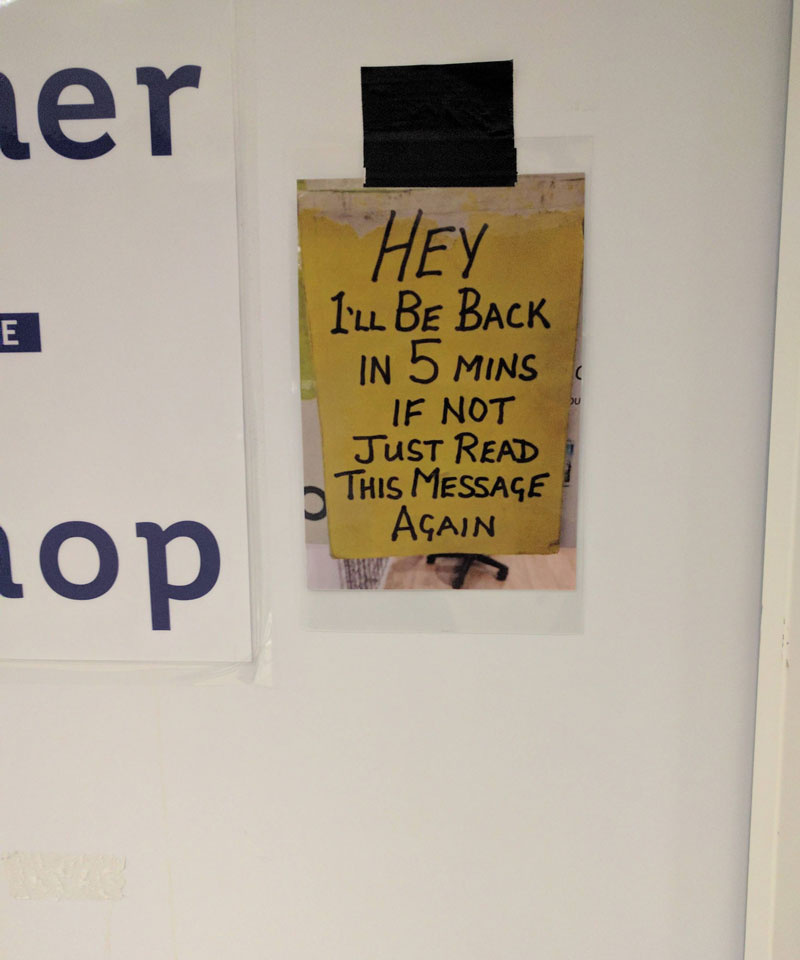 Sign on the door of the company mailroom