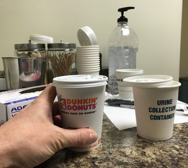 The patient specimen cups are dangerously similar to my coffee cup