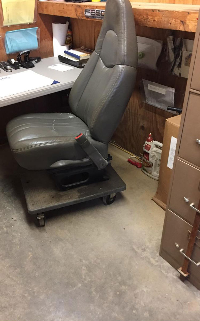 The company I work for wouldn't buy the guy that runs the shop a new rolling chair... so he improvised and rides in style
