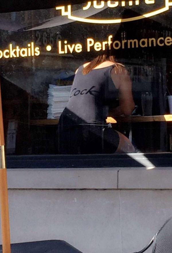 This window advertisement left an unfortunate shadow on a restaurant patron
