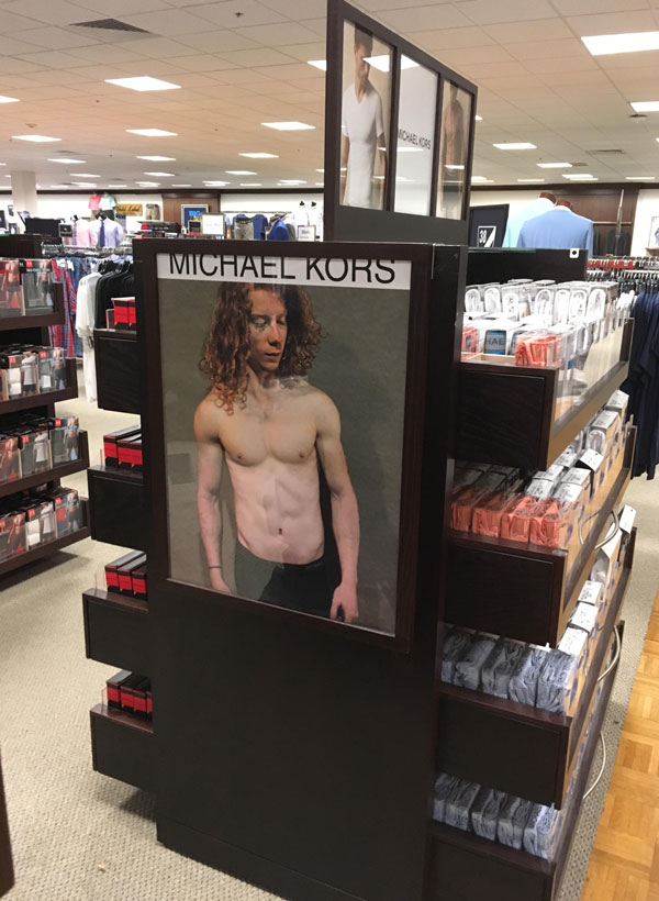 Coworker photoshopped himself in a Michael Kors ad on his last day. No ones noticed