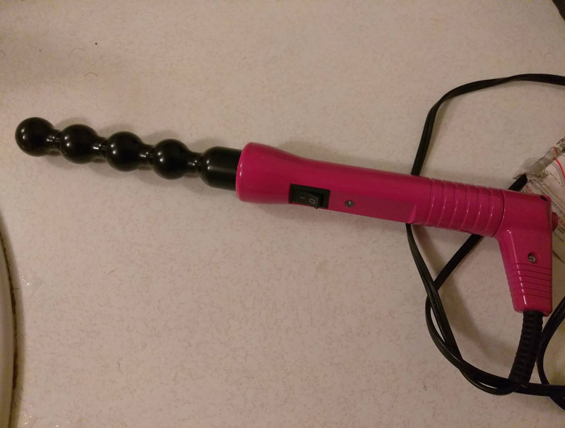 PSA: Dads, if you find this in your daughter's room... it's a curling iron
