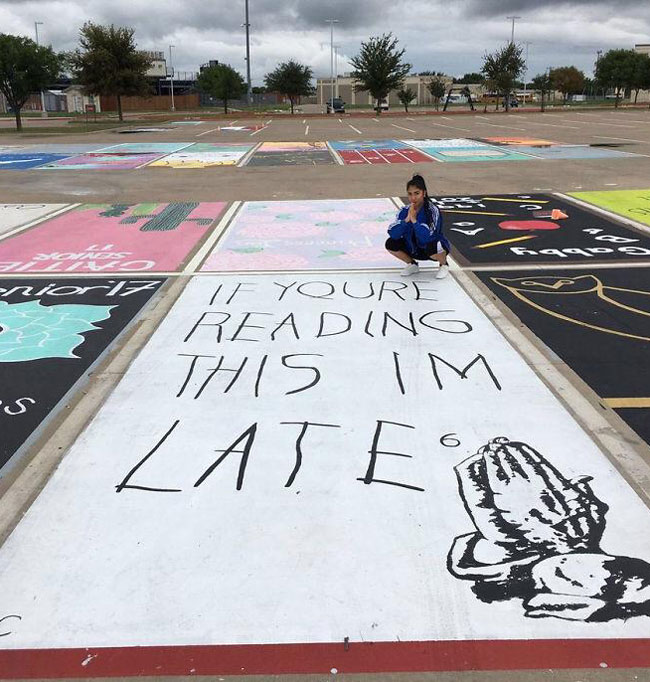 High school seniors painted parking spots