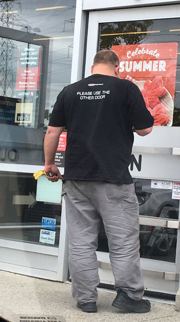 This door repair man's shirt