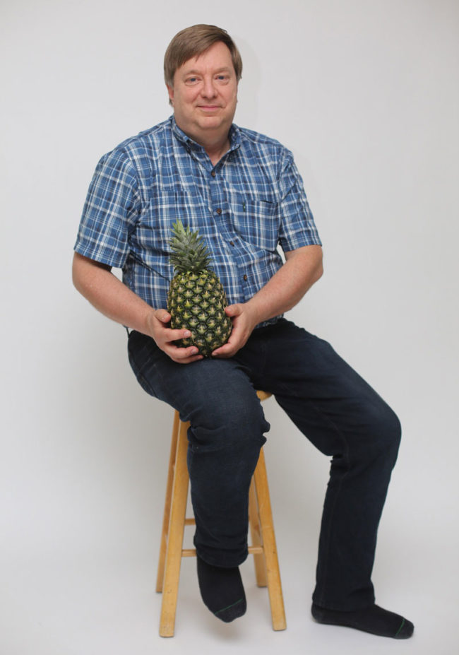 My dad has been trying to grow pineapples for the last year, today he succeeded, look how proud he is