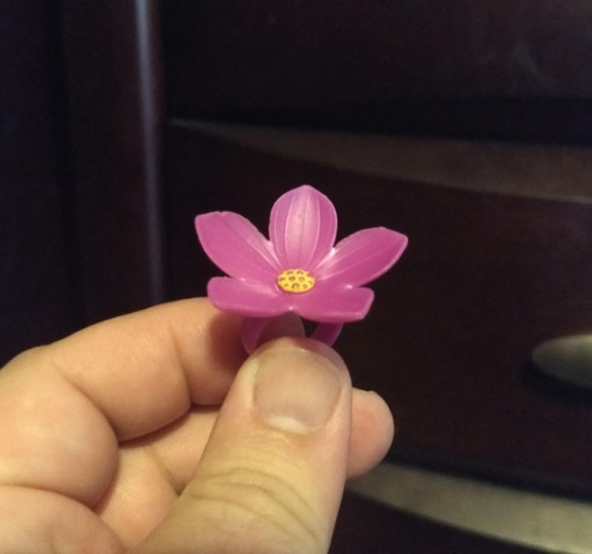 My daughter handed this ring to me today and said, "Take this with you to work so you can look at it all day and remember how much I love...flowers."