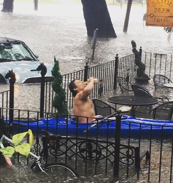It's flooding after heavy rain in New Orleans but the bars are still open