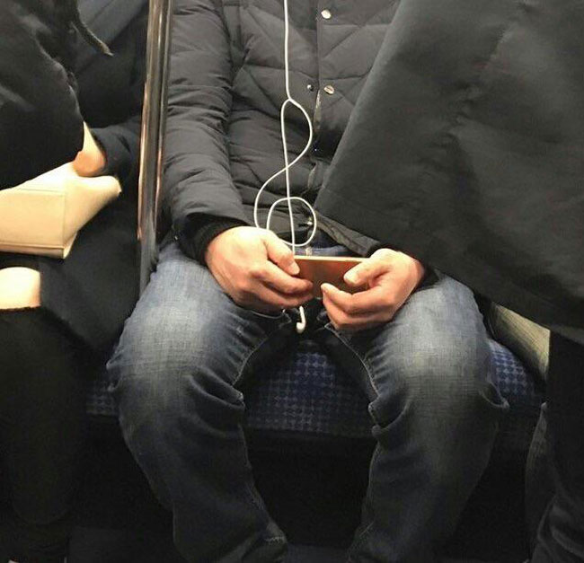 He's definitely listening to music..