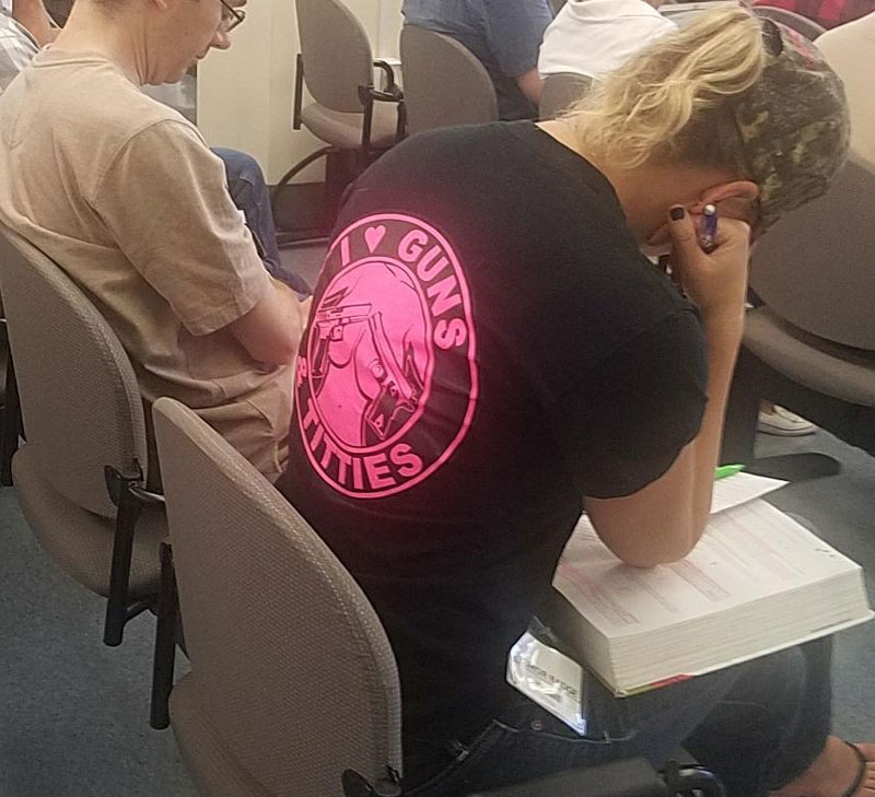 Waiting for potential jury duty and spot the girl in front wearing this t-shirt, looks like a sure fire way to avoid being selected