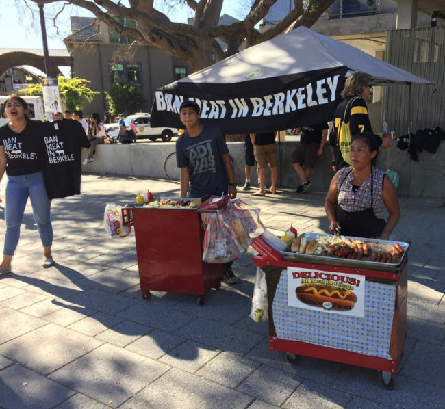Entrepreneurs selling hot dogs in front of a Ban Meat at Berkeley stand