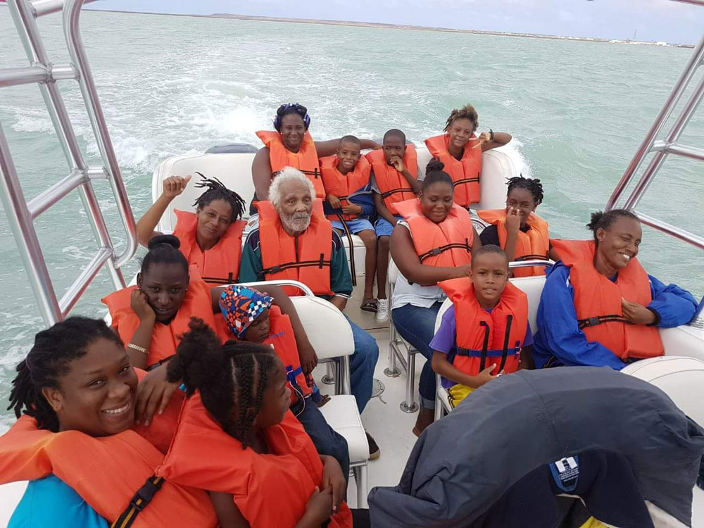 My cousin helping evacuate the island of Barbuda in preparation for a second hurricane hitting today, the boat trip to Barbuda was loaded full with water, food and clothes. After all these people have lost they're still smiling
