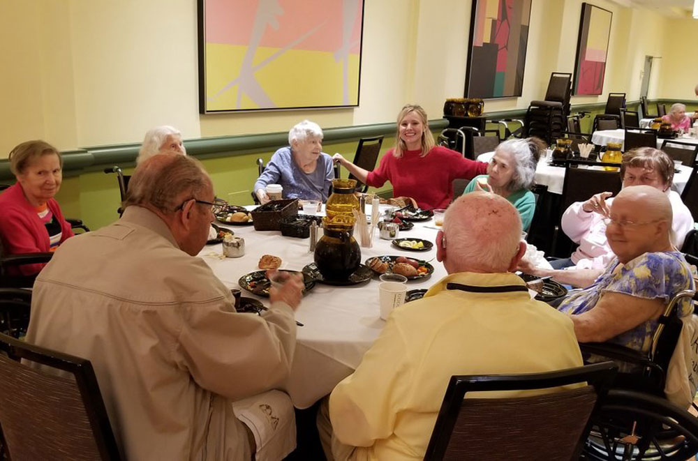 Senior home evacuees sent to a hotel to hide from Hurrican Irma. Kristen Bell happened to be staying there and decides to keep them company