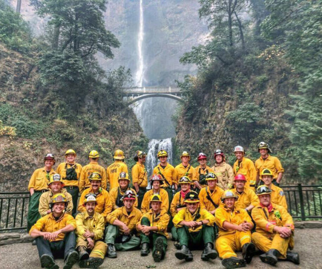 Some of the Oregon firefighters who worked to save the Multnomah Falls Lodge, built in 1925, from the encroaching wildfire
