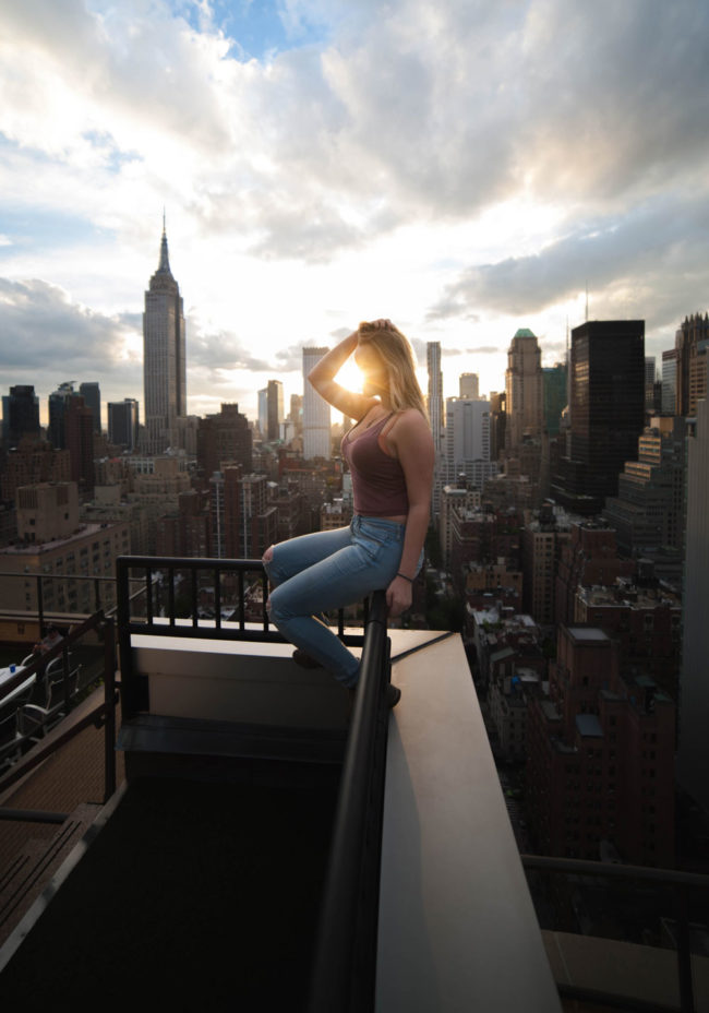 My gf sitting on a roof in NYC